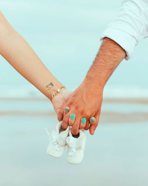 Portrait of a pregnant woman,holding hands, maternity