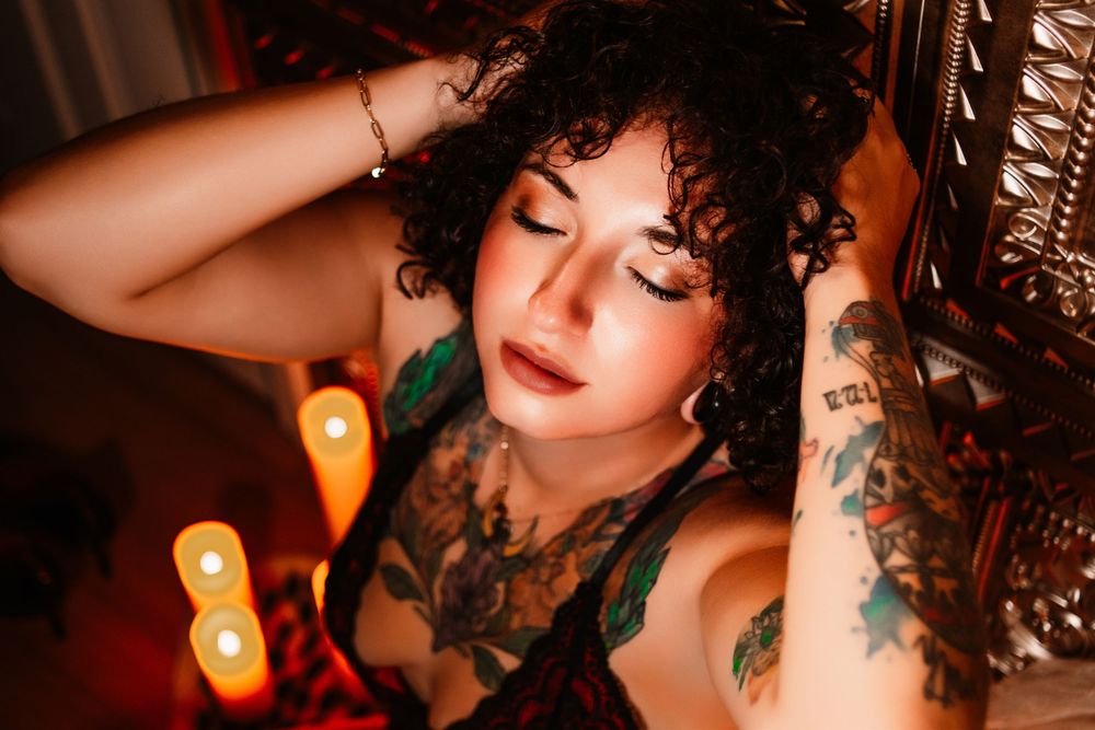 Golden glow, fearless energy. Empowering boudoir portraits in front of our luxe gold tile backdrop.