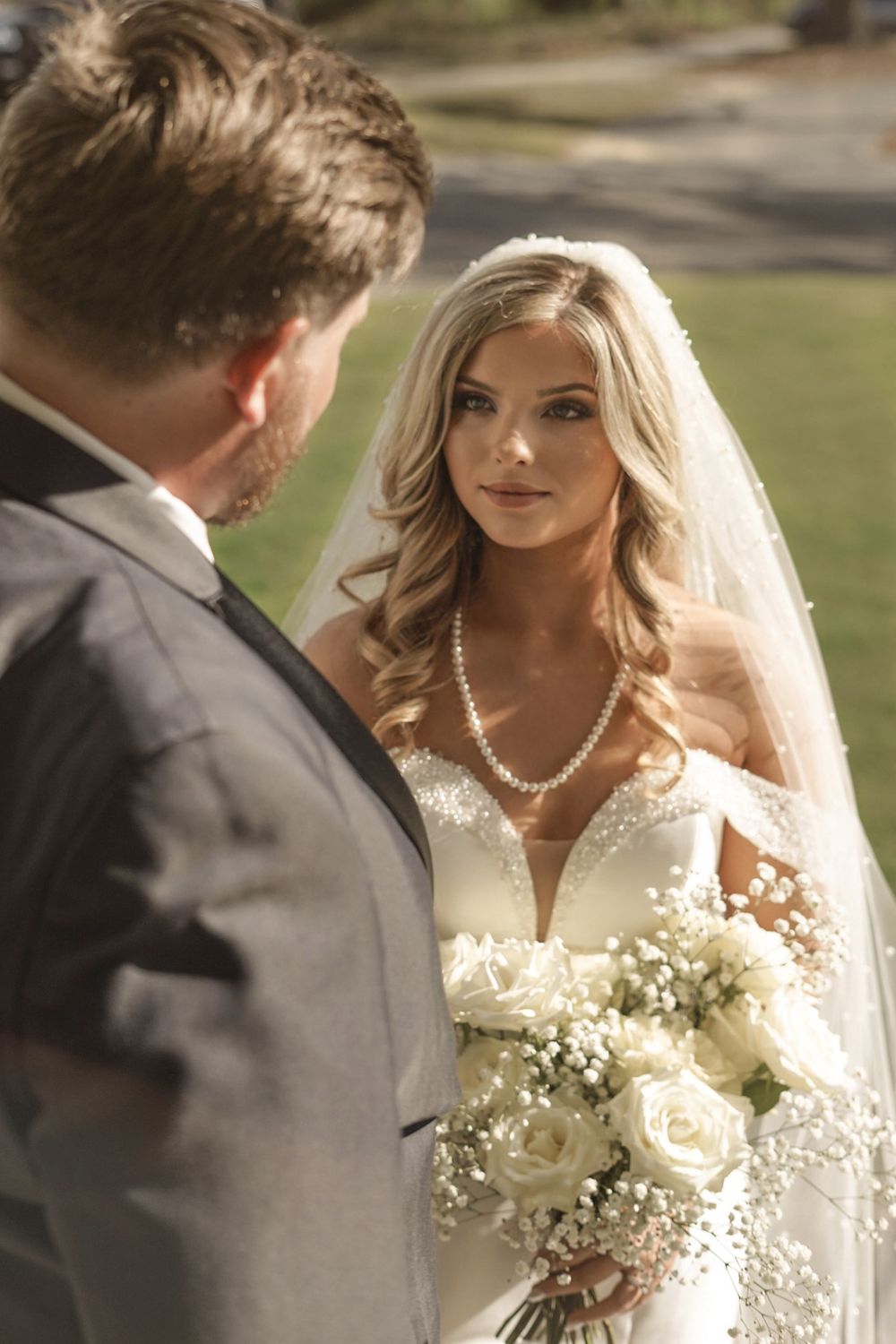Elegant outdoor portraits in North Georgia’s countryside — romantic light and upscale wedding style.