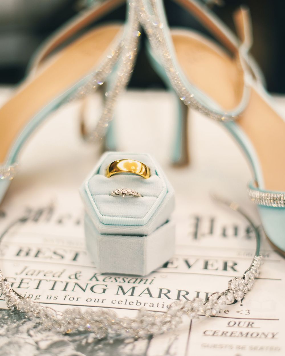 Fine-art detail of wedding rings at the coast of Georgia celebration — modern luxury photography style. Capturing full wedding day