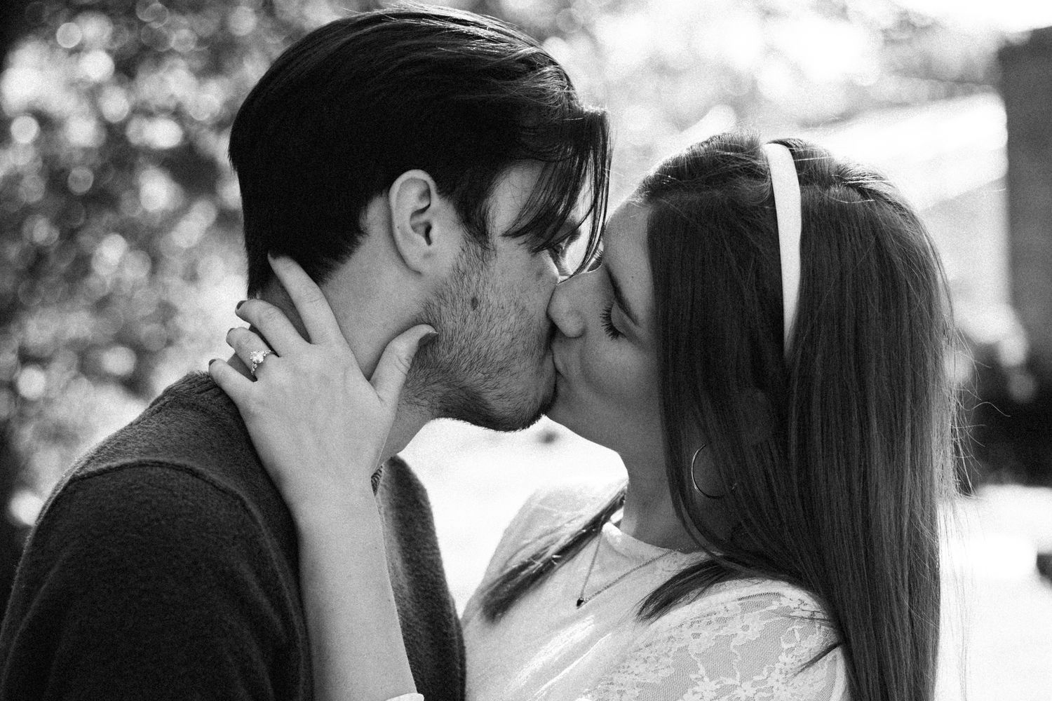 Series of romantic black and white photos capturing intimate moments between a couple.