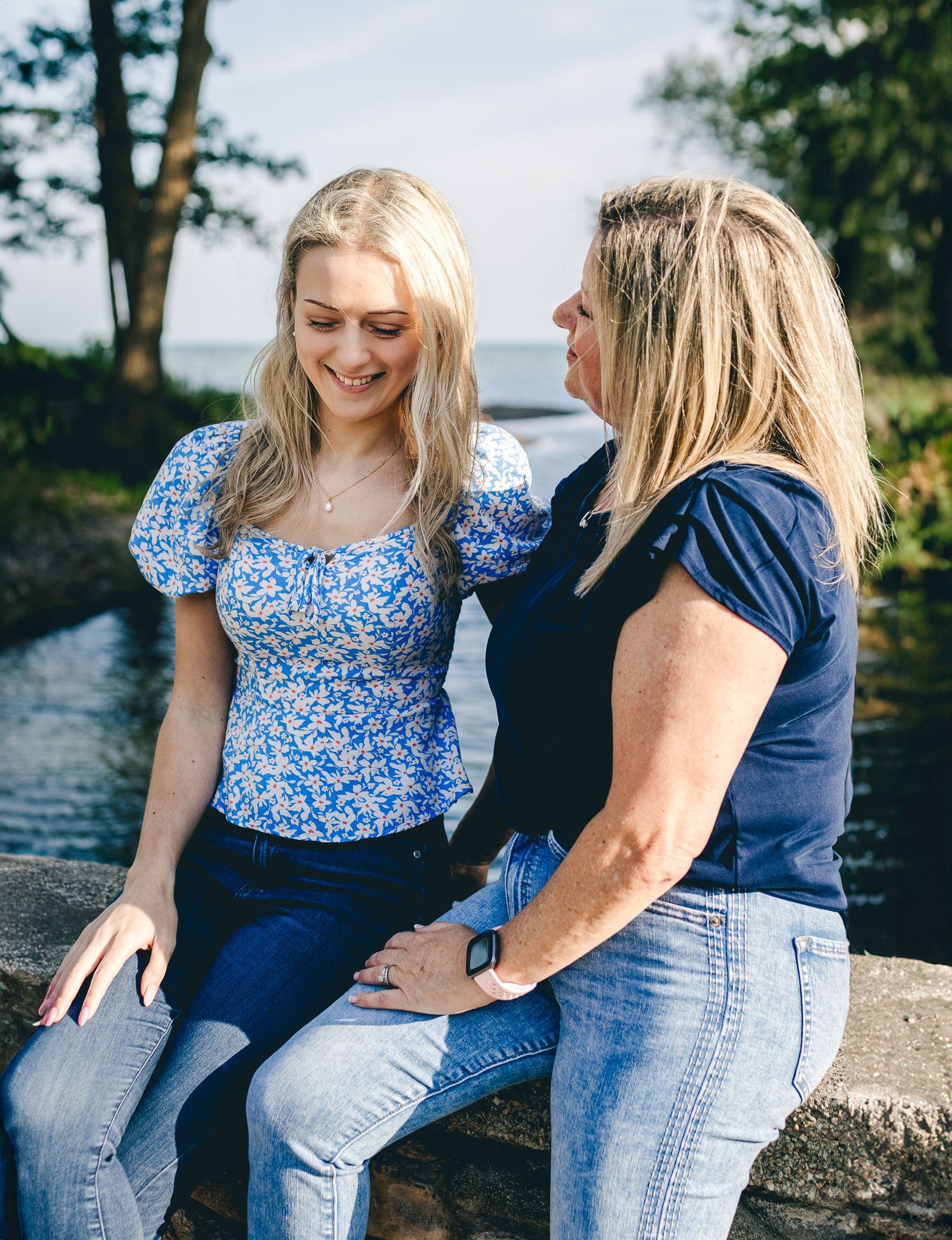 Portrait of mother and daughter laughing