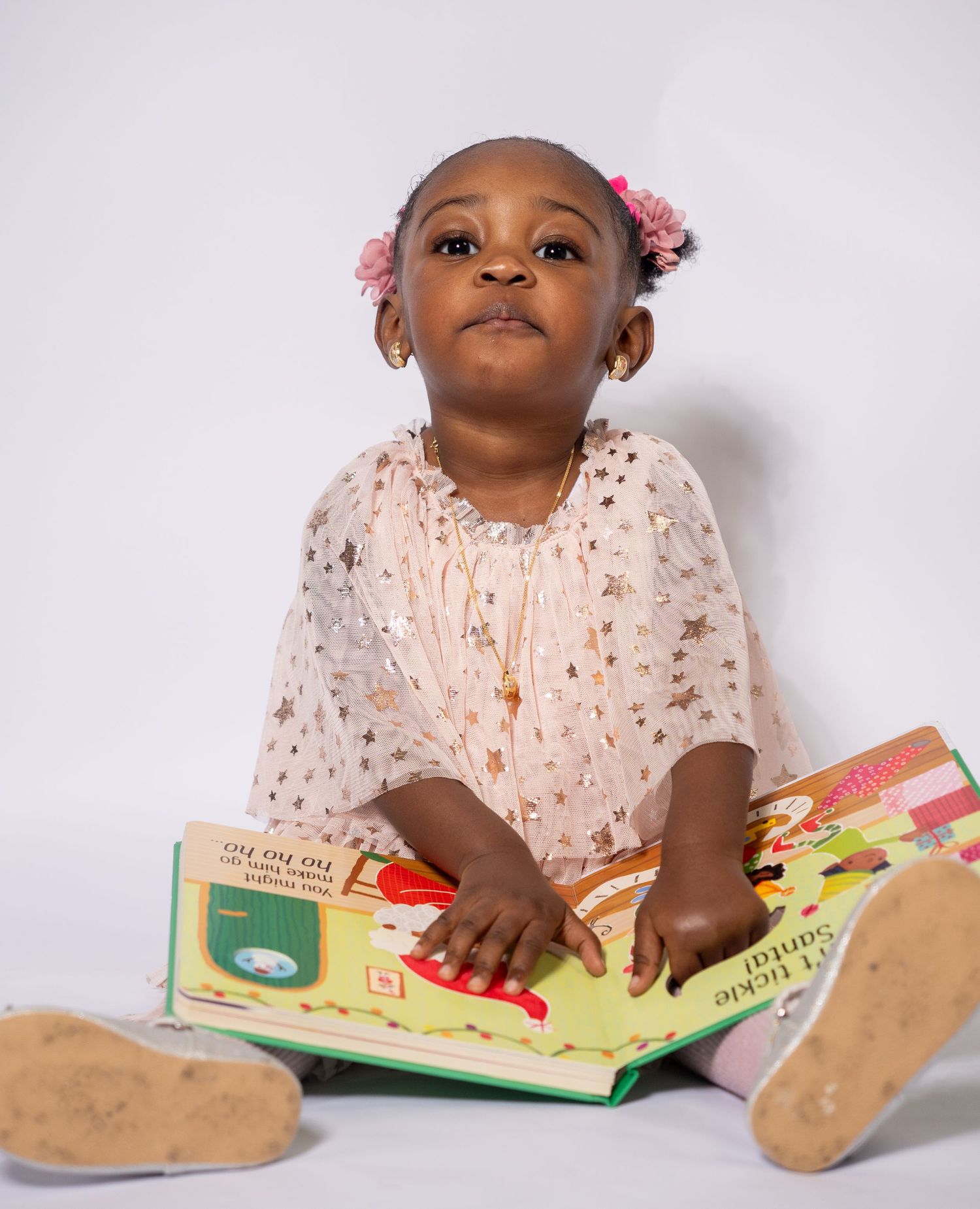 kid holding a storybook