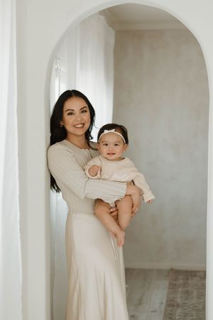 Timeless first birthday photos along with a mommy and me session at a studio in Huntington Beach