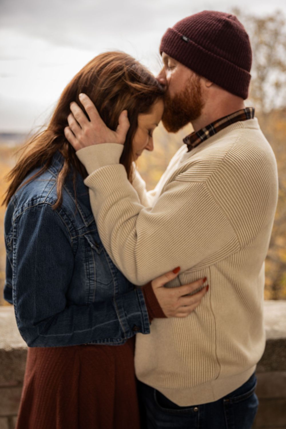 A romantic sequence of photos showing a couple in denim and cream sweater sharing intimate moments outdoors.
