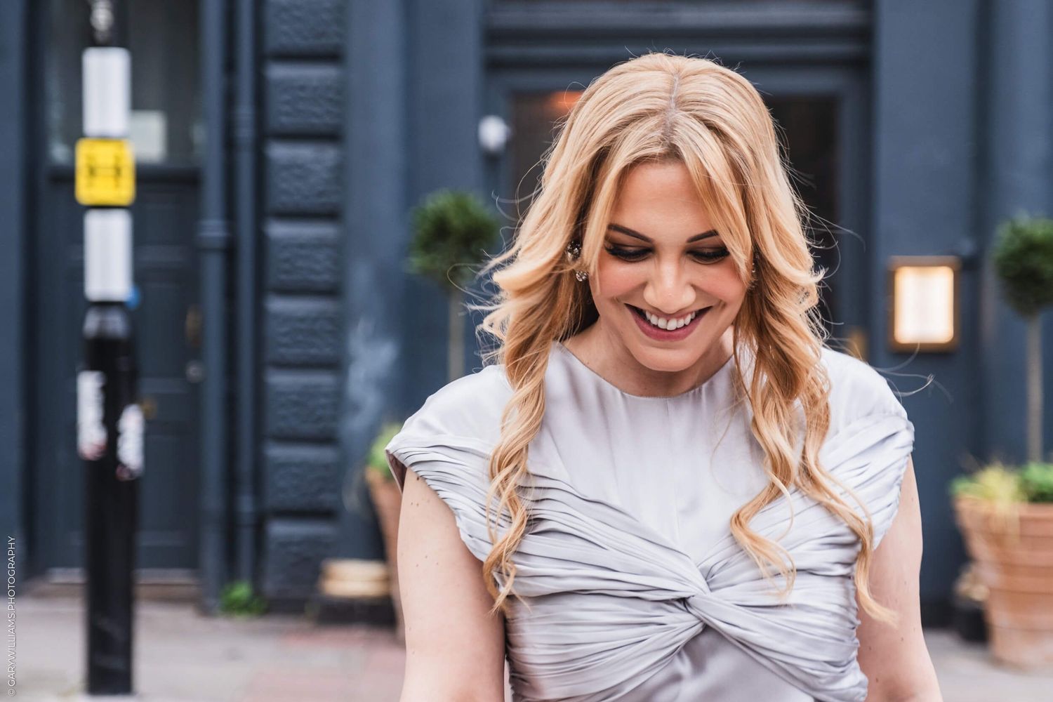 A woman caught candidly in the streets of London.
