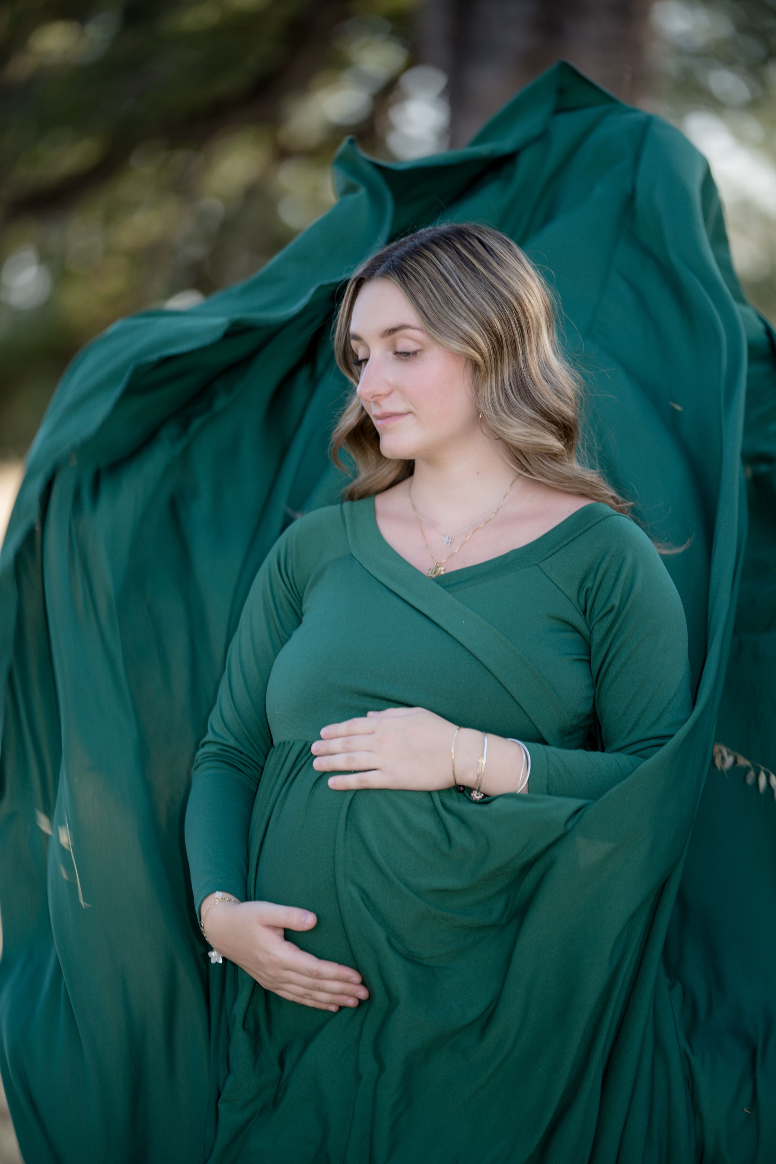 Maternity portrait at Jedediah Smith Memorial Trail (Lake Natoma) in Folsom by Folsom photographer, Ashley Nicole Baeza.