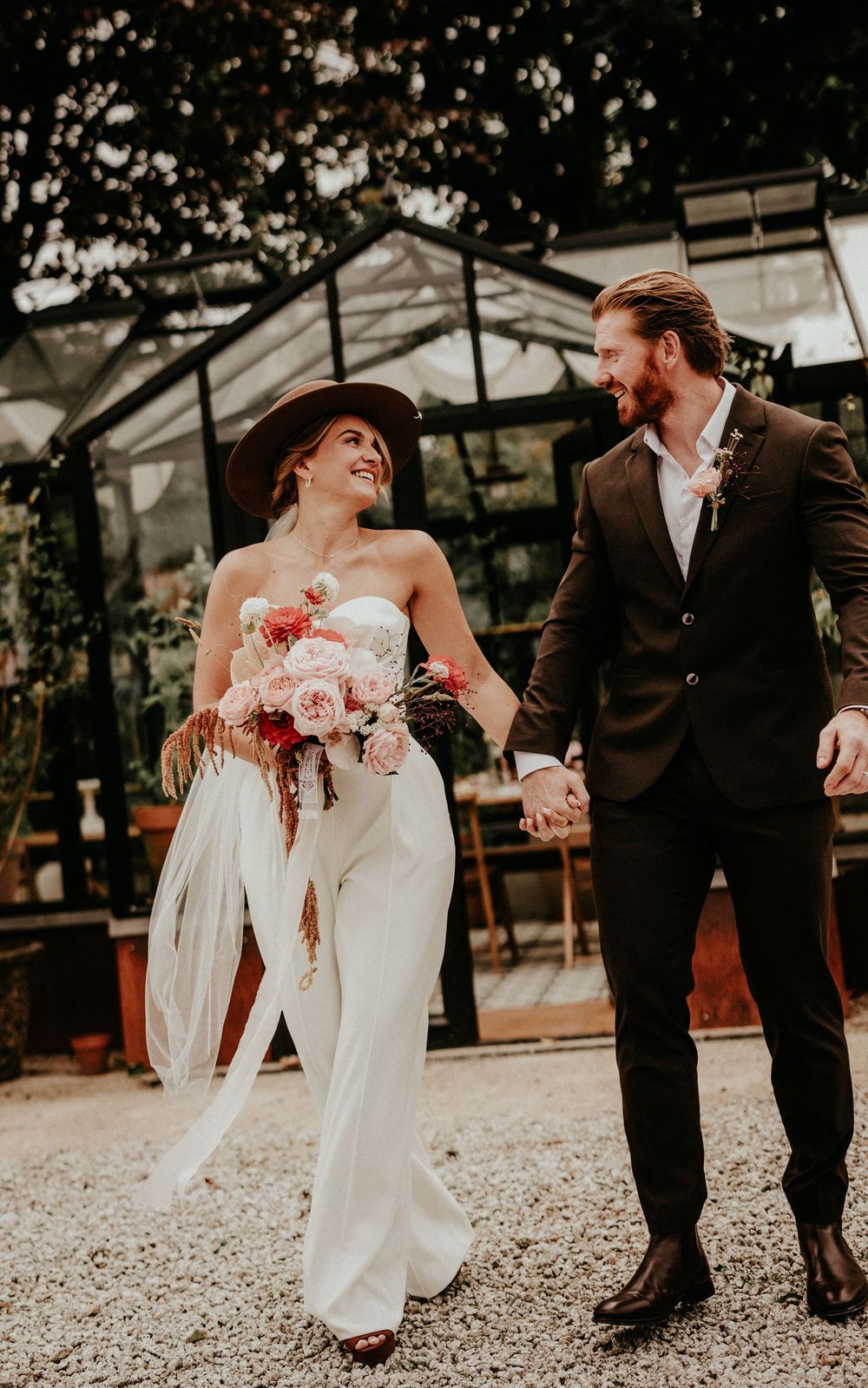 A romantic wedding couple shares playful moments in a sequence of photos showing them dancing and dipping outdoors.