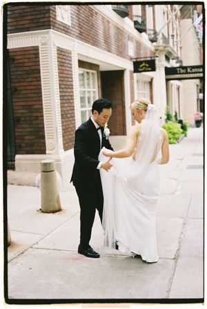 A sequence of wedding photos showing playful moments between a couple on a brick-lined city sidewalk.