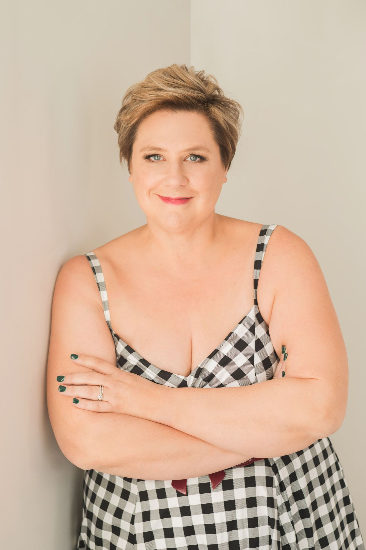 Contemporary portrait series in black and white gingham pattern top.