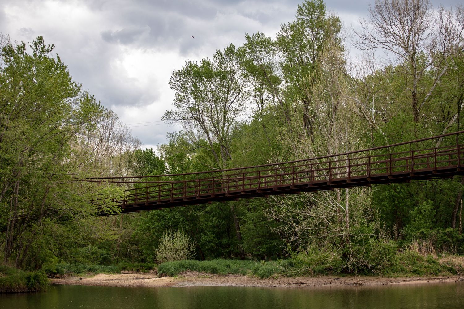 Bridge over the river. Local elopement with officiant near alton, MO