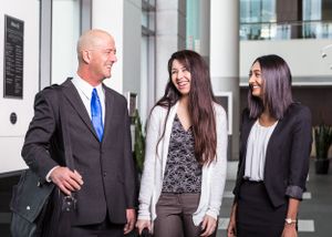 coworkers converting among each-other  Minneapolis photographer