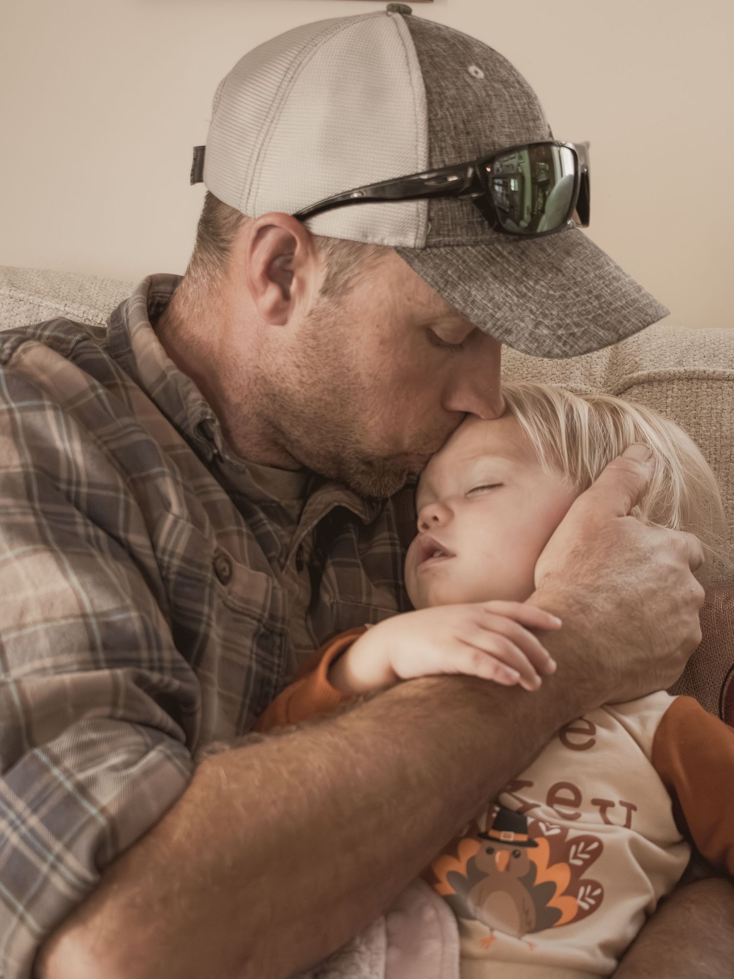 Kisses and snuggles to last forever.  Blue Onion Photography.