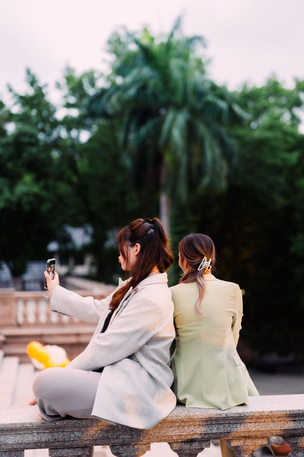 friends taking selfie at Tatung University in Taipei City