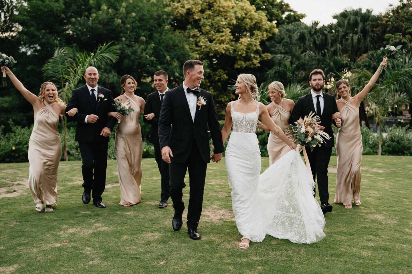 Couple walking with their bridal party on the wedding day in Costa Rica