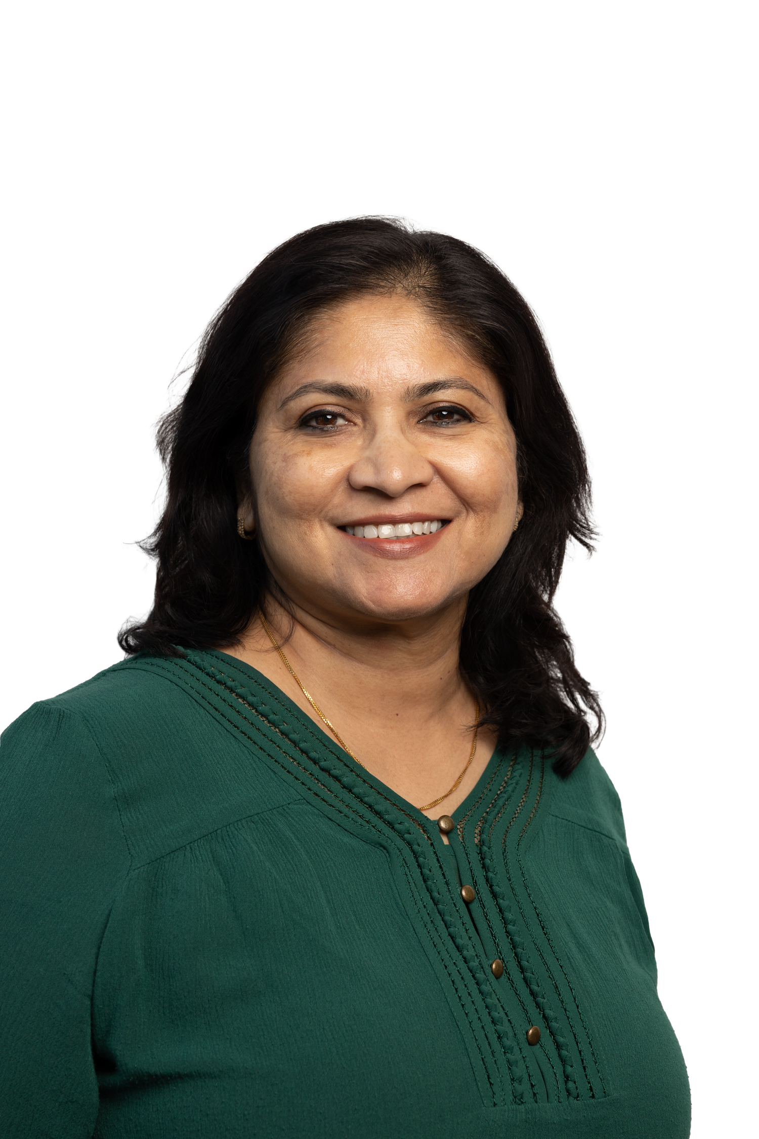 Professional headshots of someone in a green sweater smiling warmly against a dark background.