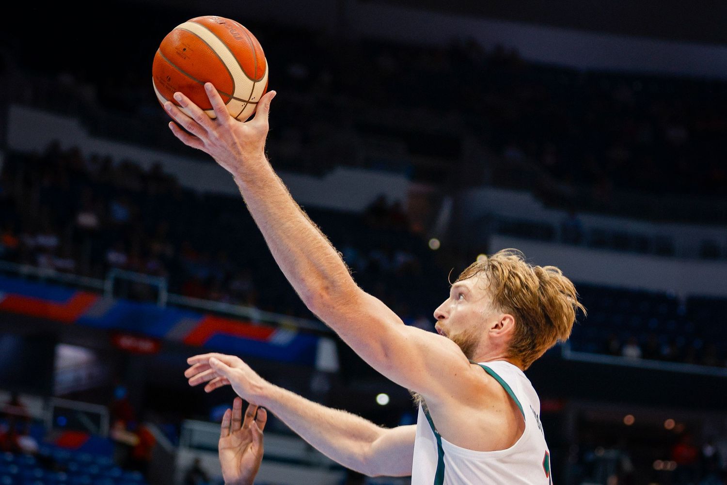 Domantas Sabonis of Lithuania shoots the ball against Puerto Rico during the 2024 FIBA Olympic Qualifying Tournament.