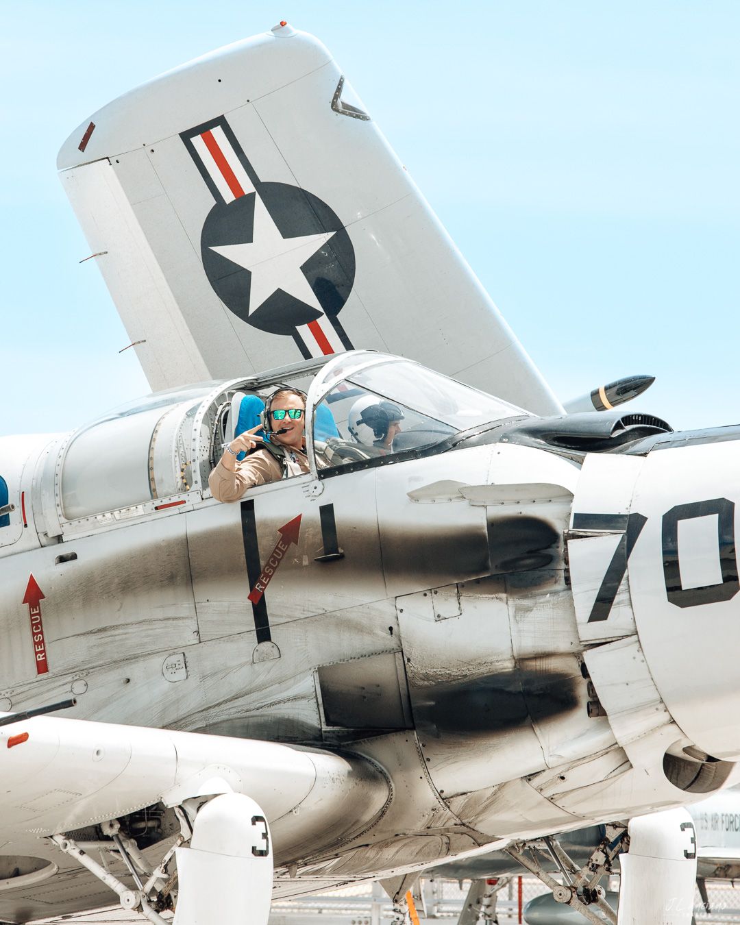 Vintage military aircraft with US Air Force markings and tail number 70.