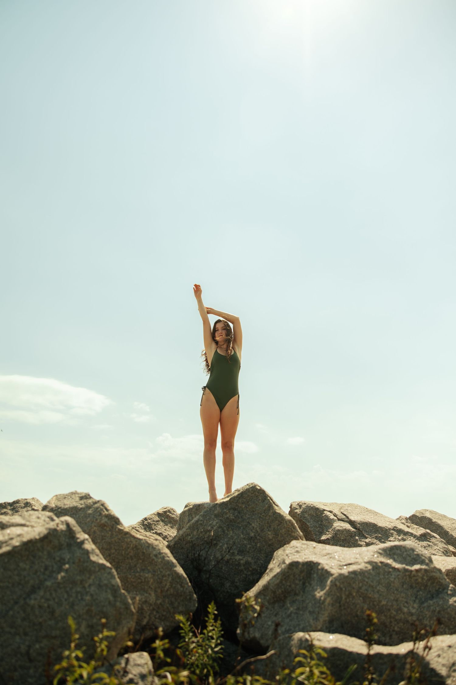 Shot of a woman stretching at Carolina Beach.