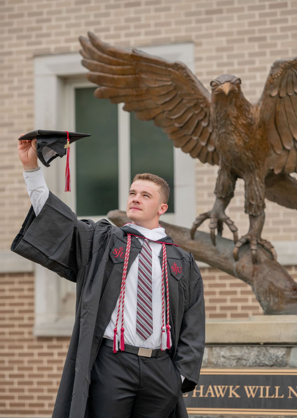 male student graduation saint joes university