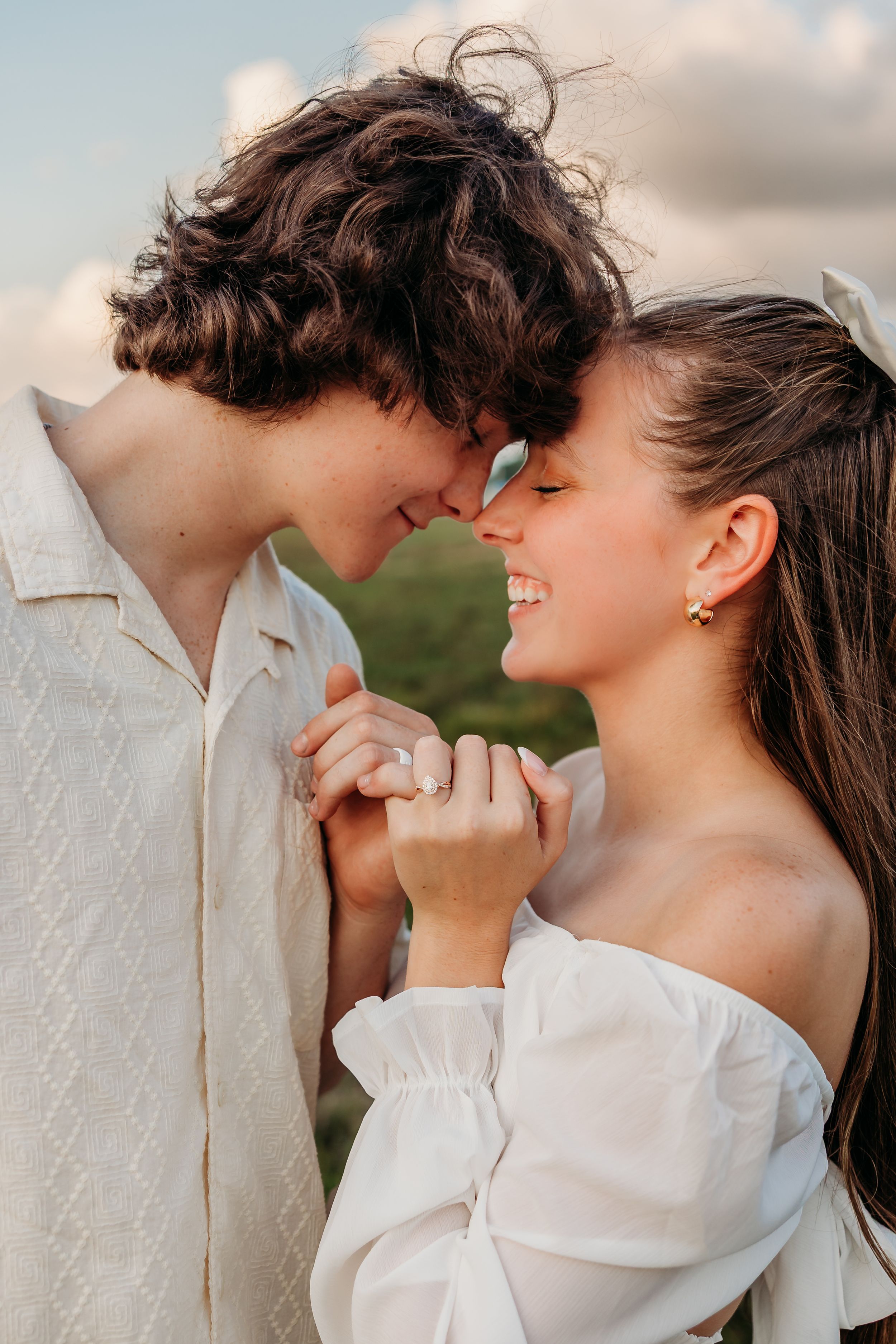 Engaged couple pinky promising with eyes closed. Cincinnati Wedding photographer. NKY wedding photographer. Chicago Wedding Photographer.
