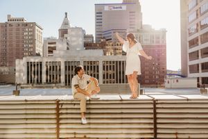 Engagement photos in golden light on a rooftop. Cincinnati Wedding photographer. NKY wedding photographer. Chicago Wedding Photographer.