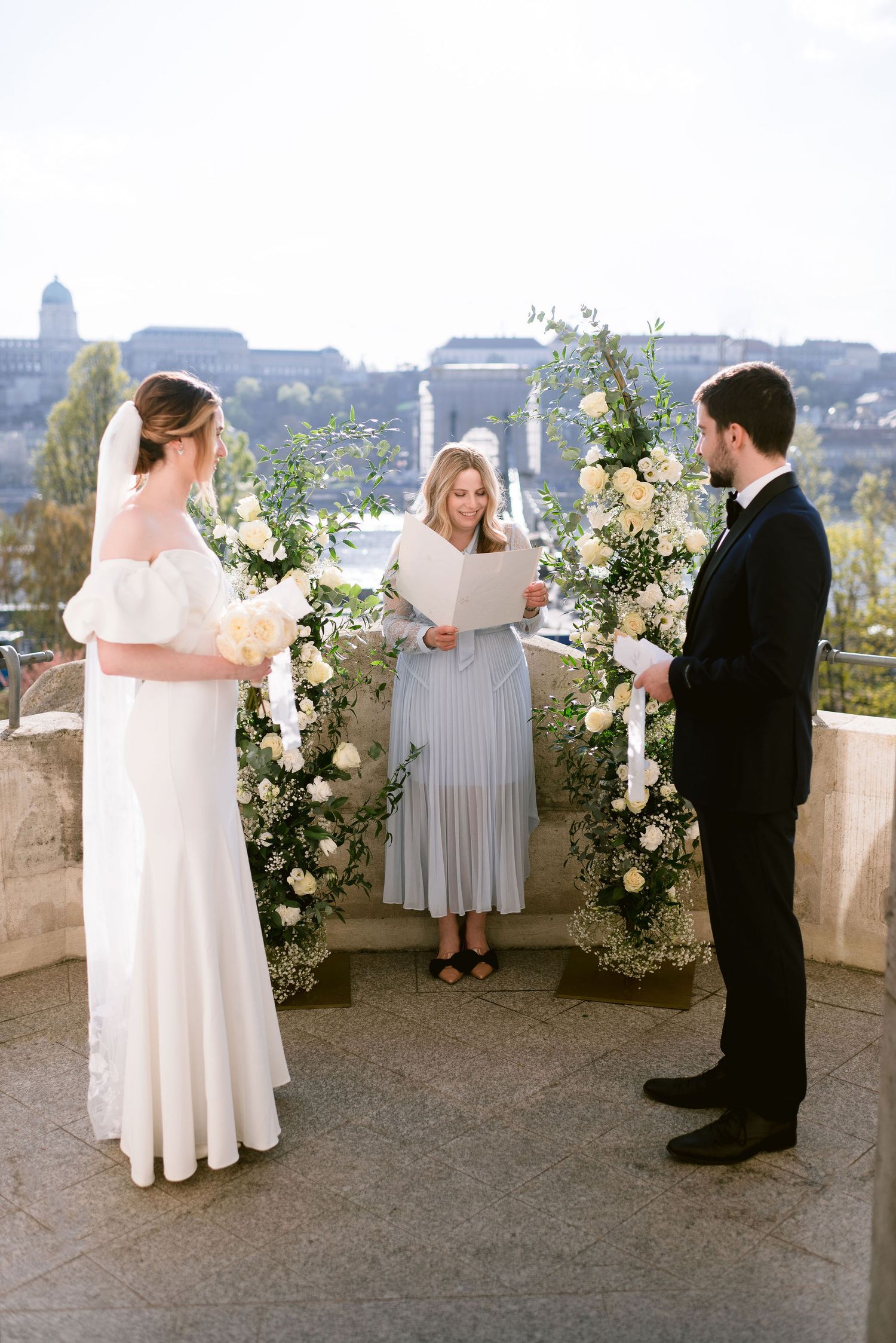 Chic elopement in Budapest with soft florals and modern minimalist styling
Sunset elopement in Budapest featuring a bride in a flowing gown