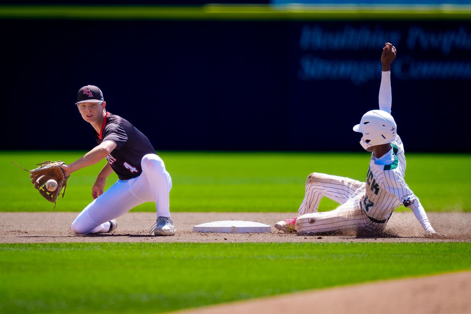 Infielder fielding throw as runner slides into base at PIAA State Baseball Championship, by Deanna Fox, SportsFox Photography, Hershey PA