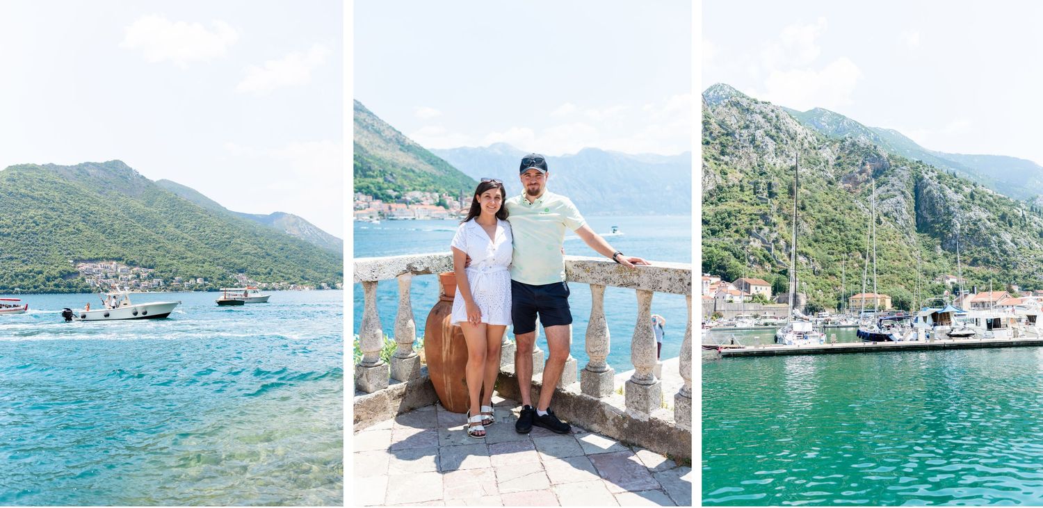 Scenic coastal view of a Mediterranean bay with crystal clear turquoise water, mountains, and a couple posing on a stone terrace.