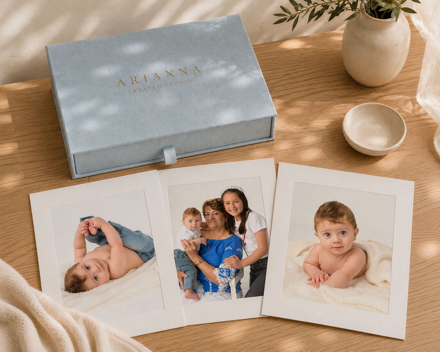 Heirloom photo box with matted fine art prints from Arianna's Creative Studio, preserving maternity, newborn, and family photos