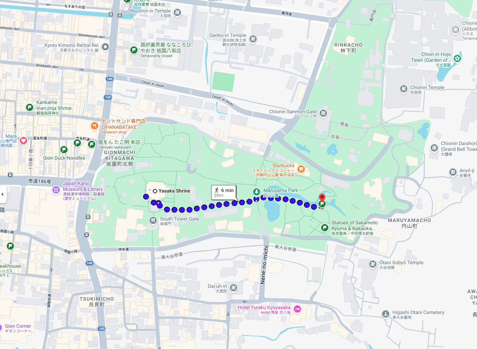 Map showing a green park area with a marked walking route in an urban district.