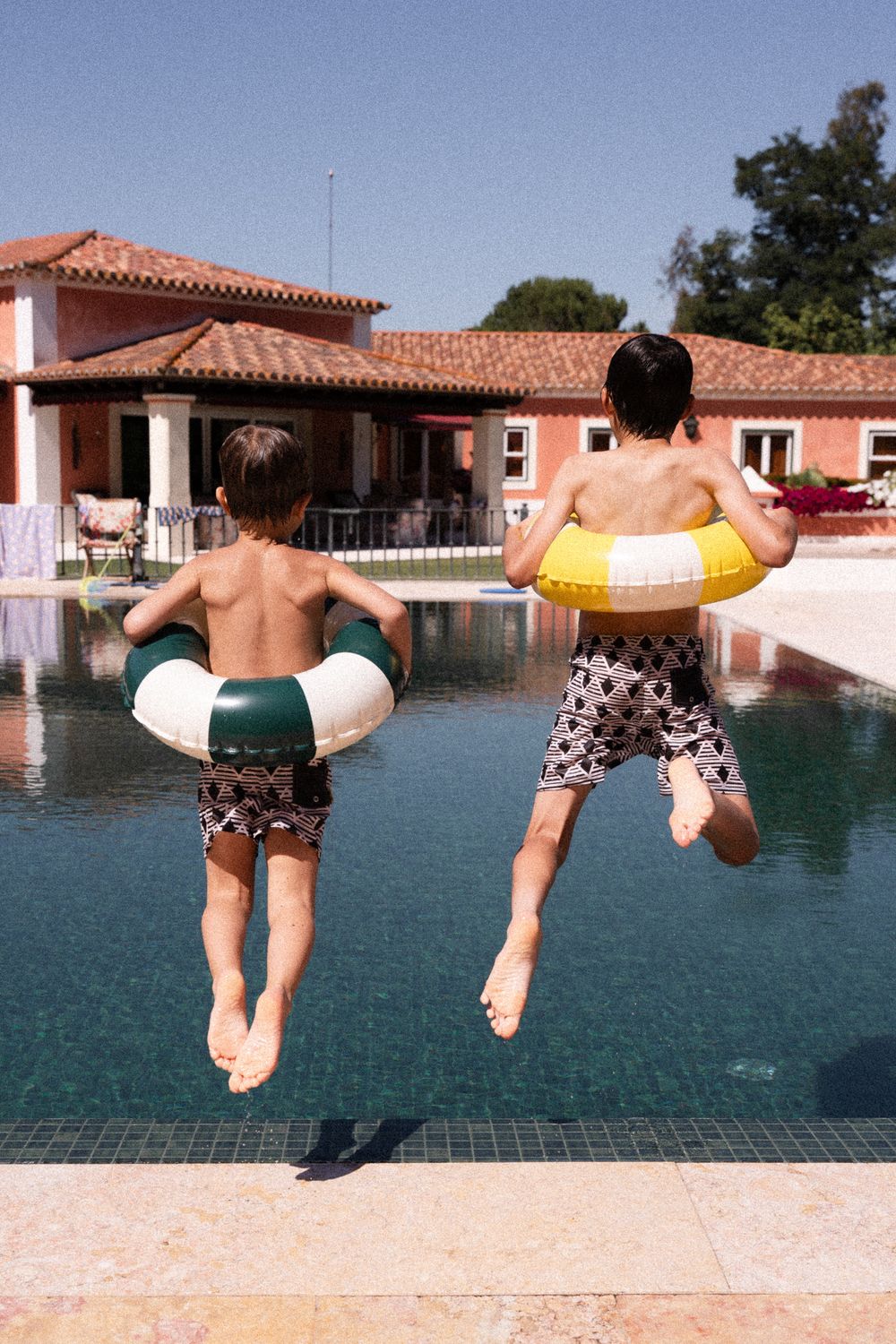 Kids playing in swimming suits
