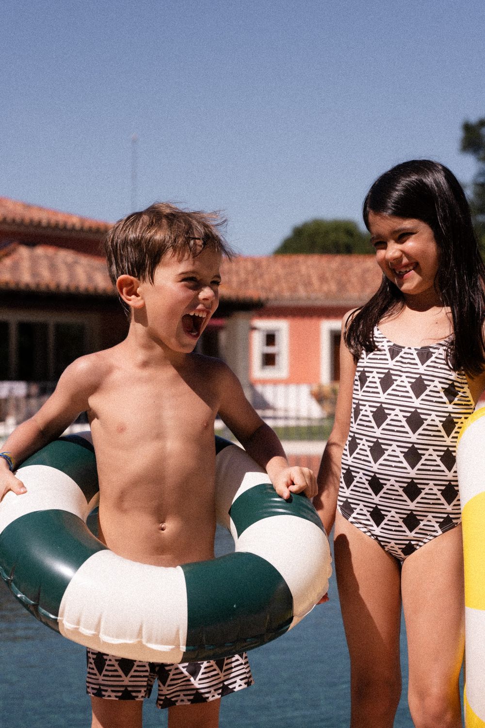 Kids playing in swimming suits
