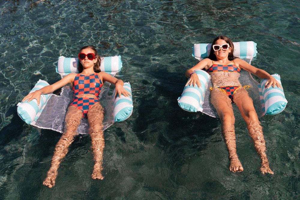 Kids playing in swimming suits