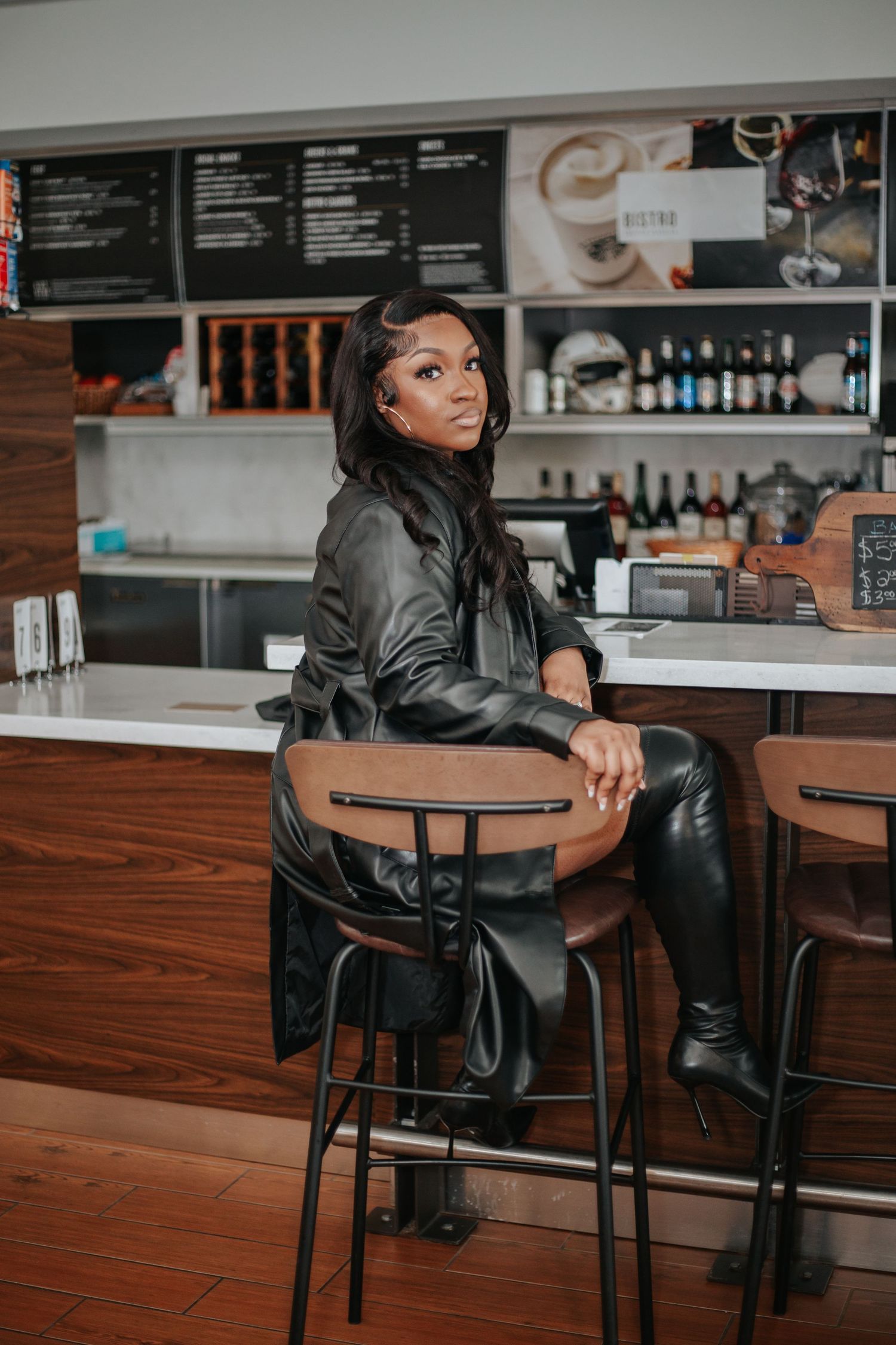 woman sitting in hotel bar photo
