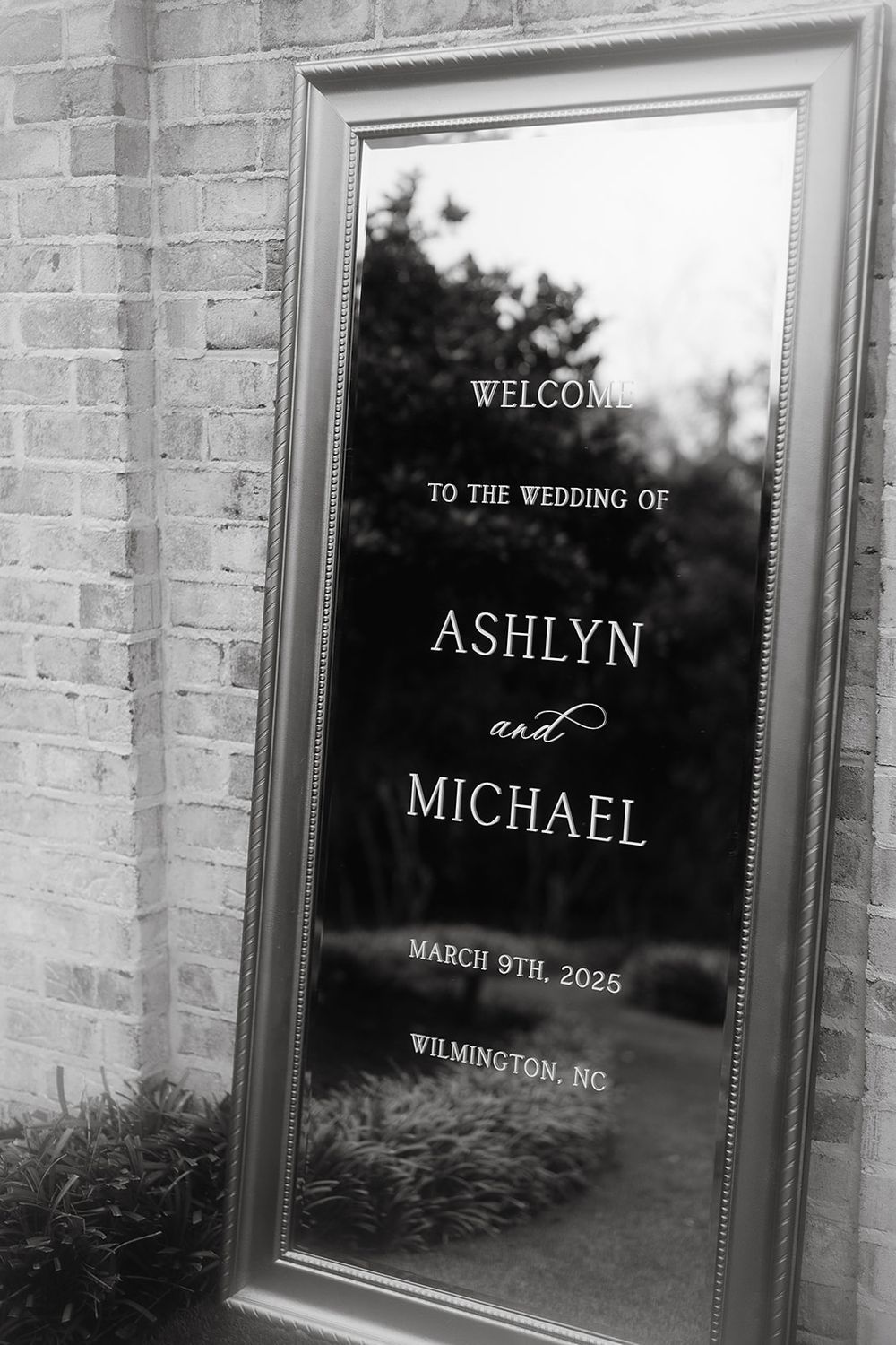 Black and white wedding welcome mirror sign for Ashlyn and Michael, March 9th 2025, Wilmington NC.
