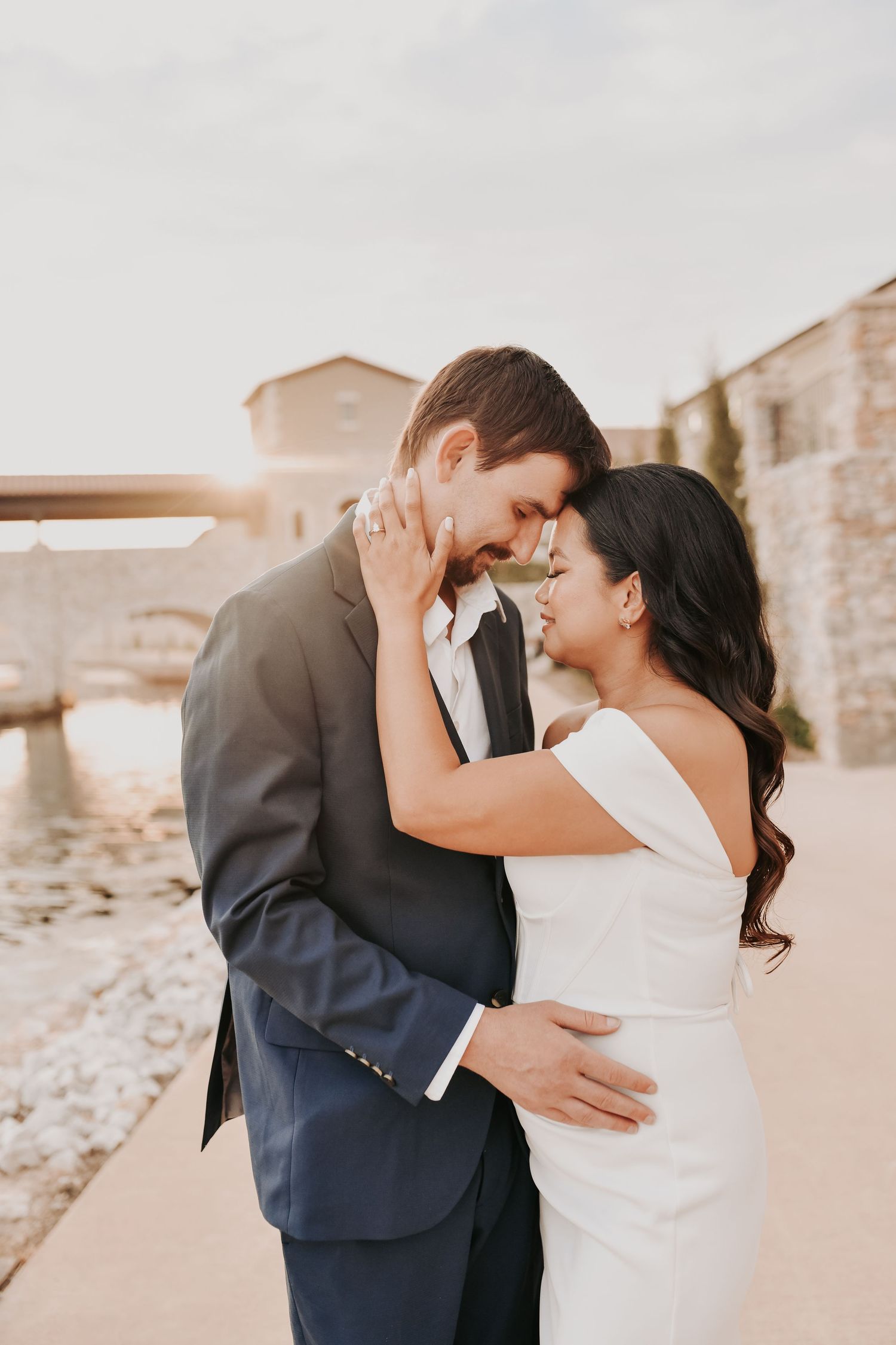 Couple enjoying a candid moment during their Chapel at Palacios engagement session