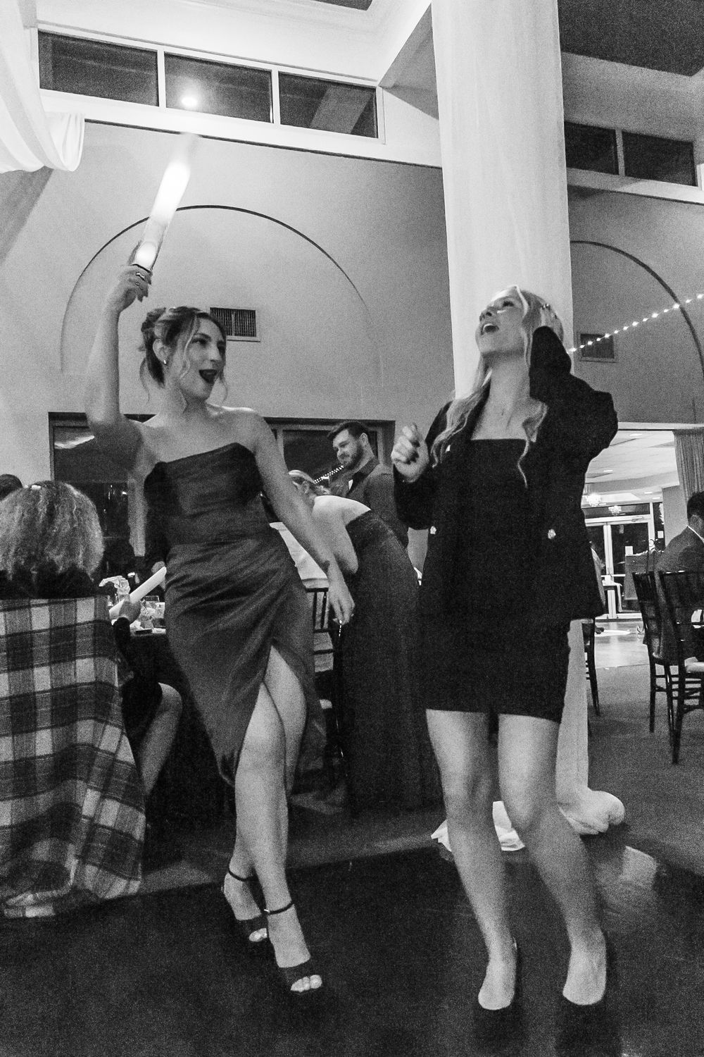 Channel Side Club in Palm Coast Florida. Wedding photography of fun wedding reception. People dancing at party.