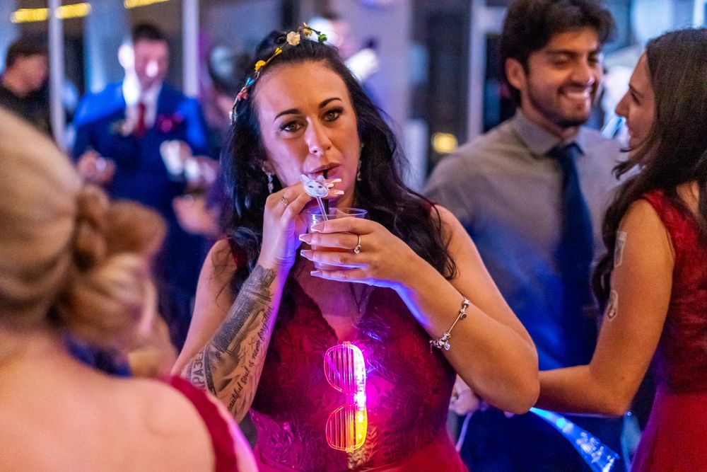 Channel Side Club in Palm Coast Florida. Wedding photography of fun wedding reception. People dancing at party.