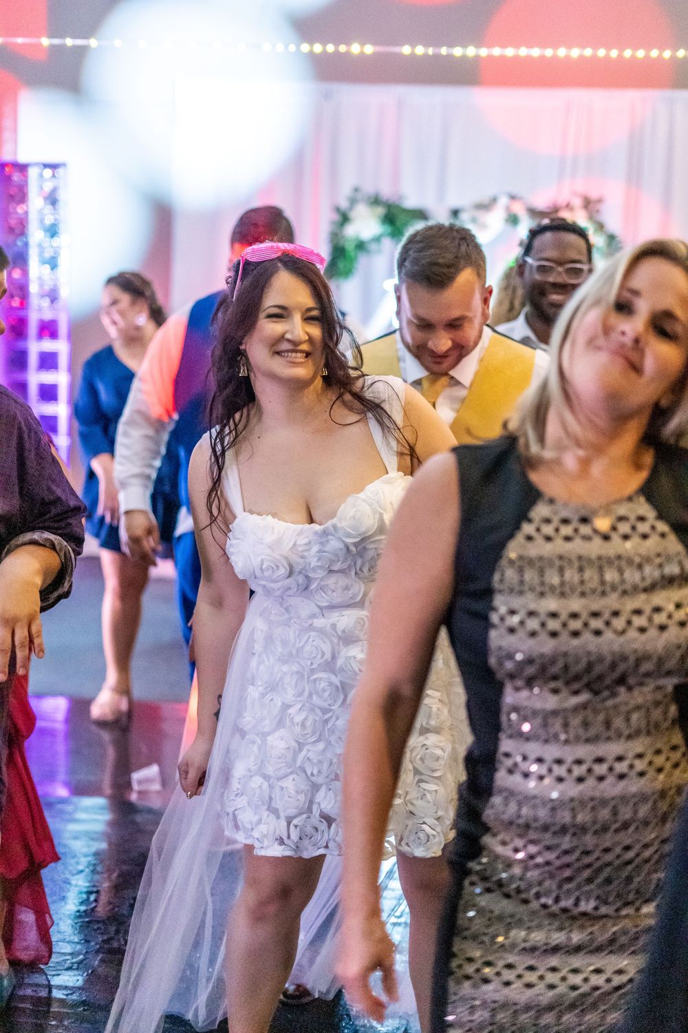 Channel Side Club in Palm Coast Florida. Wedding photography of fun wedding reception. People dancing at party.