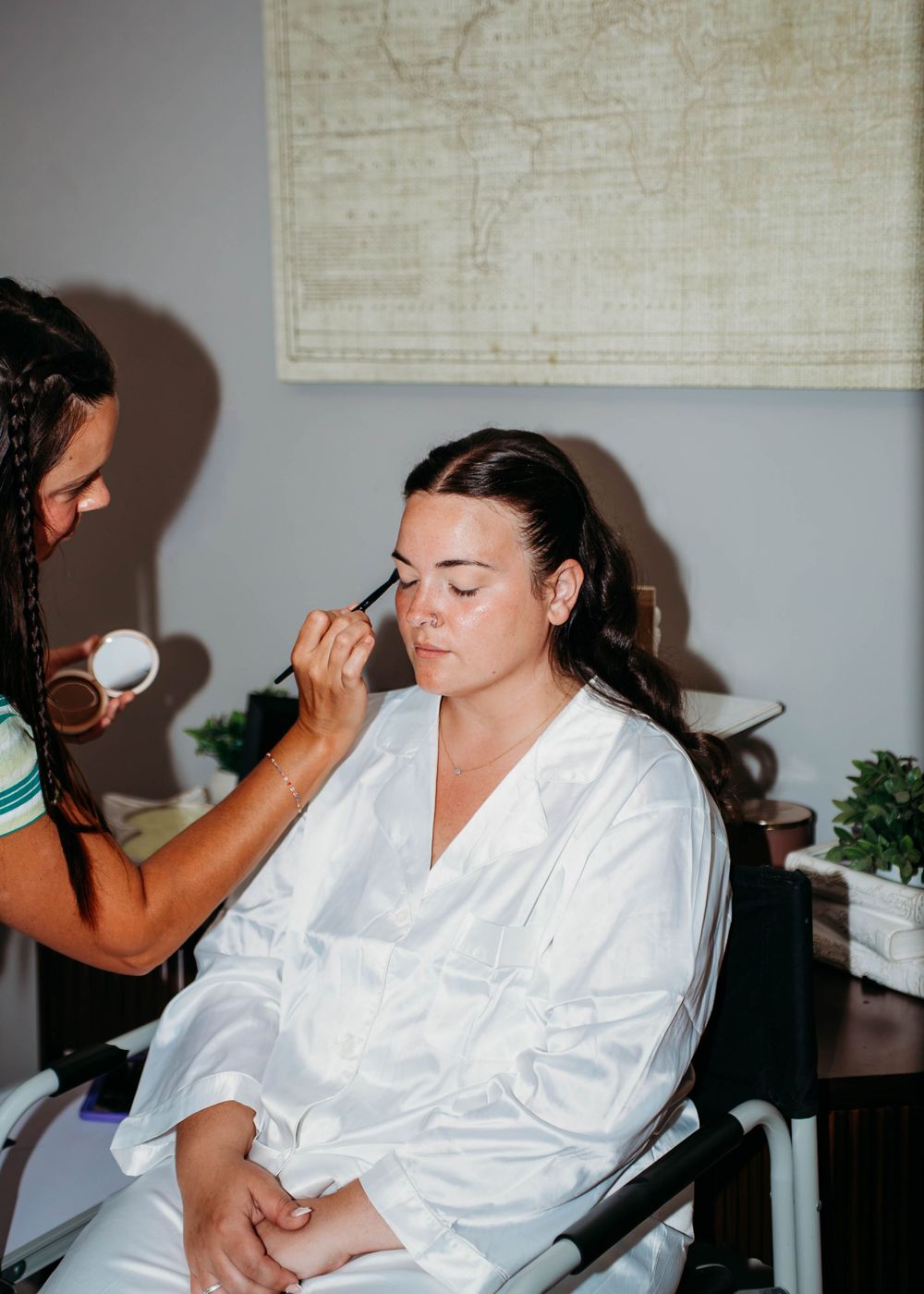 Bride getting bridal make-up in Sherwood,MI