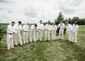 Groom and Groomsmen shotgunning beers in Sherwood,MI