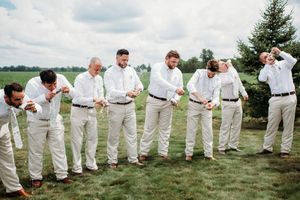 Groom and Groomsmen shotgunning beers in Sherwood,MI