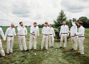 Groom and Groomsmen shotgunning beers in Sherwood,MI