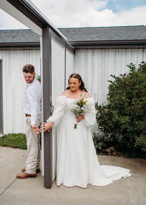 Bride and Groom doing First Touch before the ceremony in Sherwood,MI