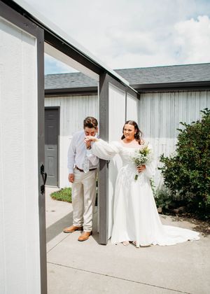 Bride and Groom doing First Touch before the ceremony in Sherwood,MI