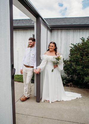 Bride and Groom doing First Touch before the ceremony in Sherwood,MI