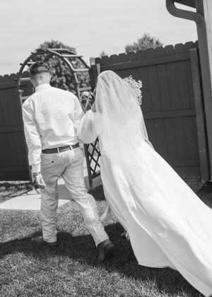 Bride and Groom walking after ceremony in Sherwood, MI