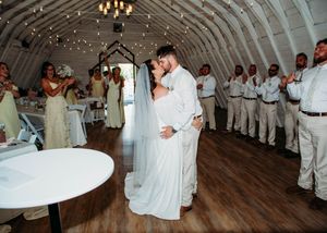 Candid photo of Bride and Groom kissing in Sherwood, MI