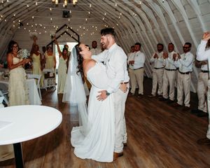 Candid photo of Bride and Groom laughing in Sherwood, MI
